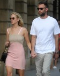 Jennifer Lawrence and Cooke Maroney hold hands on a walk through Place Vedome in Paris