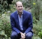 Britain's Prince William speaks with service users during a visit to the Garden House part of the Light Project in Peterborough, England, Thursday, July 16, 2020. The Garden House offers information, advice and support to the rough sleepers in Peterborough